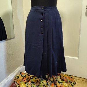 Pleated wool skirt in navy blue